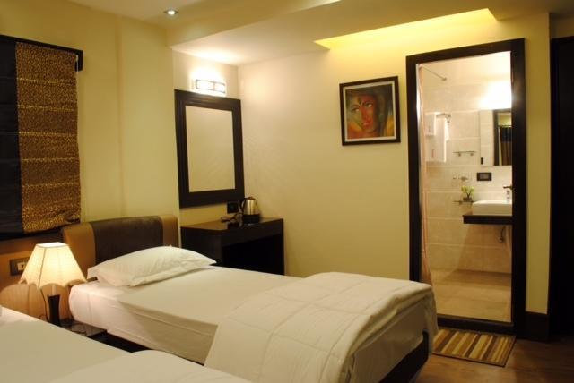 كولكاتا Tangerine Guest House الغرفة الصورة