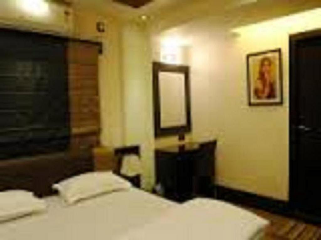 كولكاتا Tangerine Guest House الغرفة الصورة